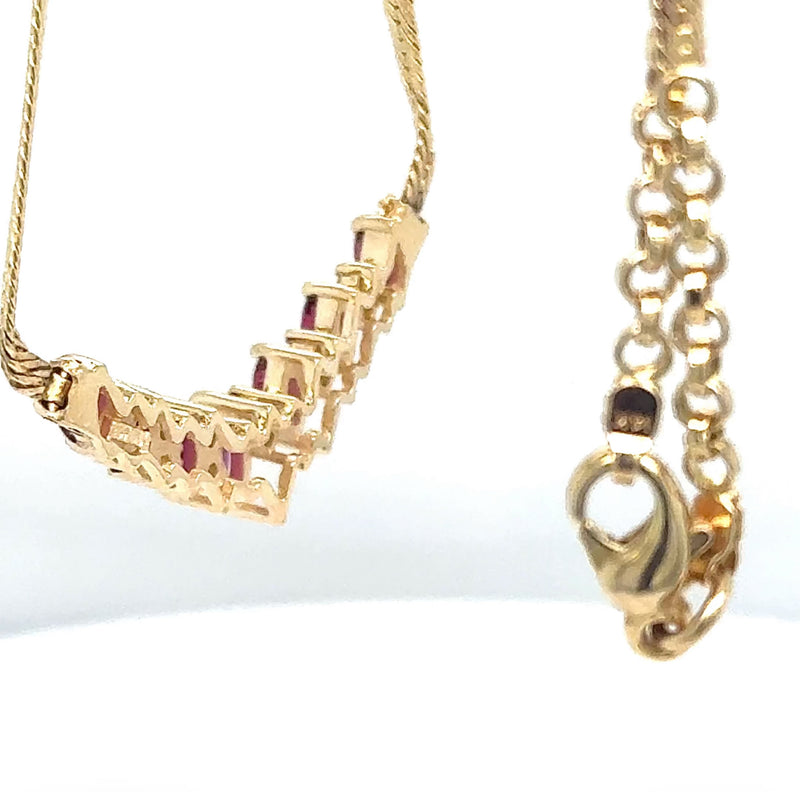 Stilvolles Rubin-Collier in 14 Karat Gelbgold mit Brillanten