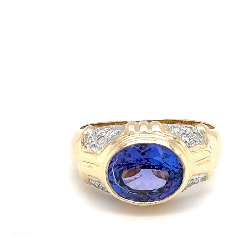 Stilvoller Ring in 14 Karat Gelbgold mit feinen Tansanit und Brillanten