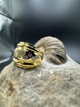 Leuchtender Ring in 18 Karat Gelbgold mit feinsten Brillanten