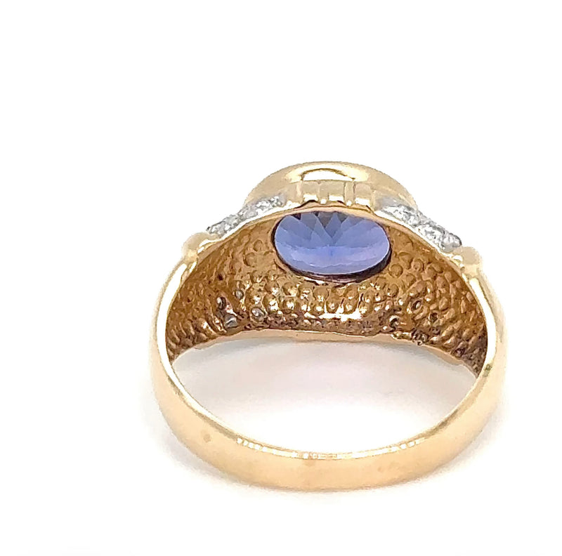 Stilvoller Ring in 14 Karat Gelbgold mit feinen Tansanit und Brillanten