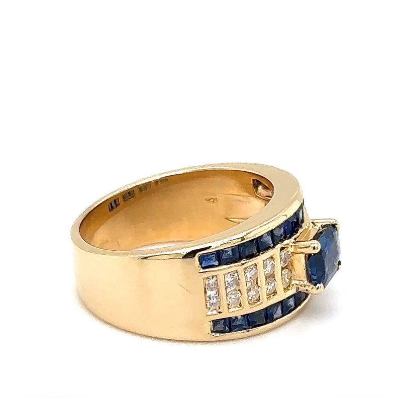 Ausgefallener Ring in 18 Karat Gelbgold mit leuchtend blauen Saphiren und Brillanten
