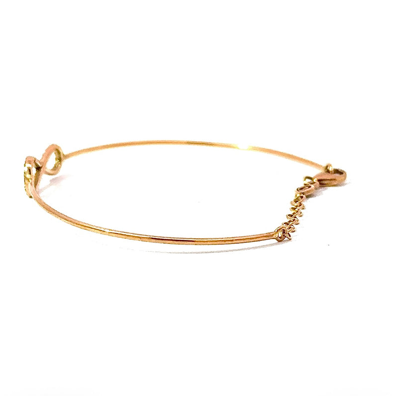 Zierlicher Armreif in 18 Karat warmem Roségold mit Unendlichkeitszeichen