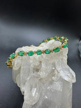 Steinbetontes Armband in 14 Karat Gelbgold mit Smaragden & Brillanten