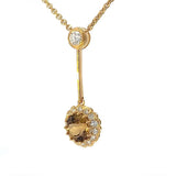 Besonderes Collier in 18 Karat Gelbgold mit gelben Tansanit & Brillanten