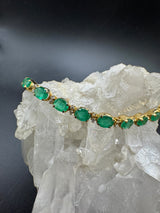 Steinbetontes Armband in 14 Karat Gelbgold mit Smaragden & Brillanten