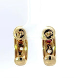 Zeitlose Halbkreolen in 14 Karat Gelbgold mit Rubin und Brillanten