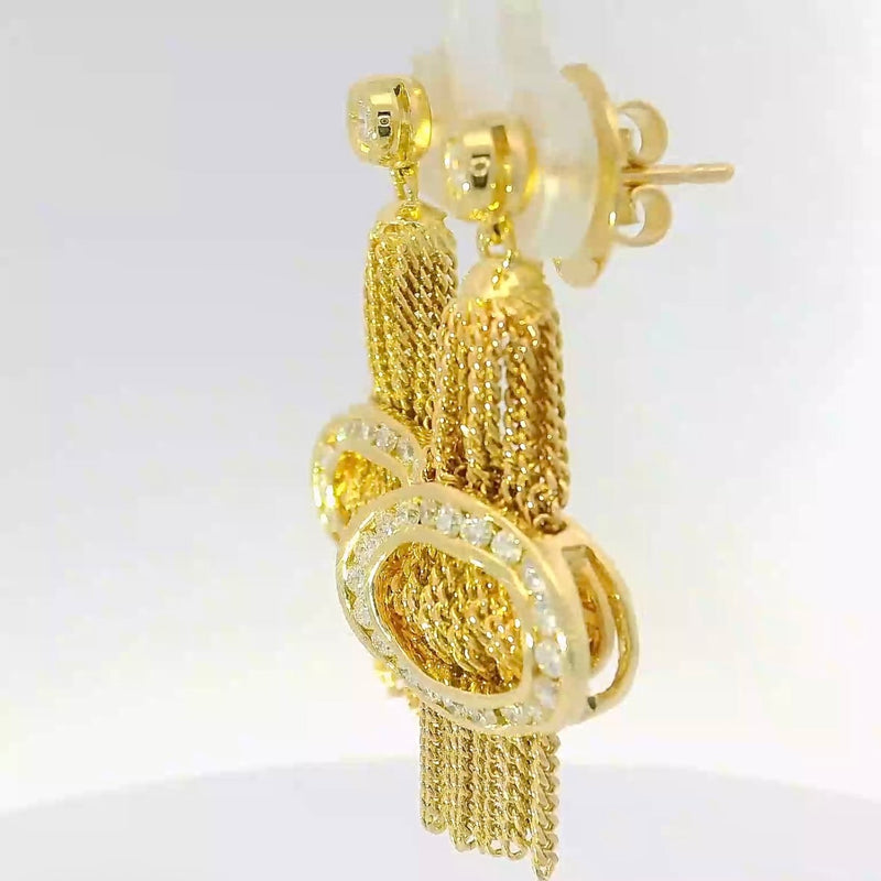 Außergewöhnliche Ohrringe in 18 Karat Gelbgold mit feinsten Brillanten