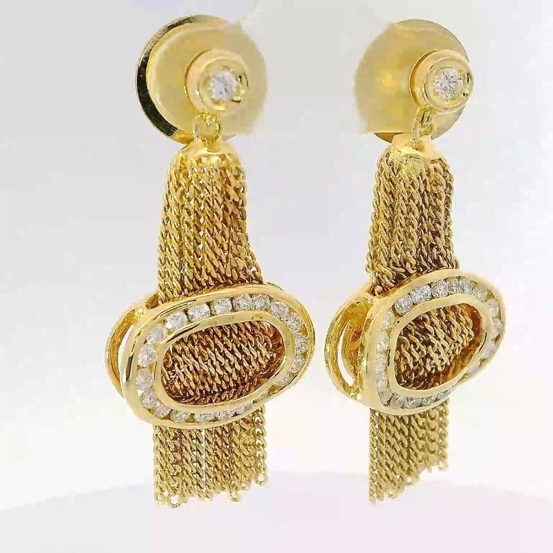 Außergewöhnliche Ohrringe in 18 Karat Gelbgold mit feinsten Brillanten