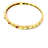 Zeitloser Armreif in 14 Karat Gelbgold mit Rubinen und Brillanten