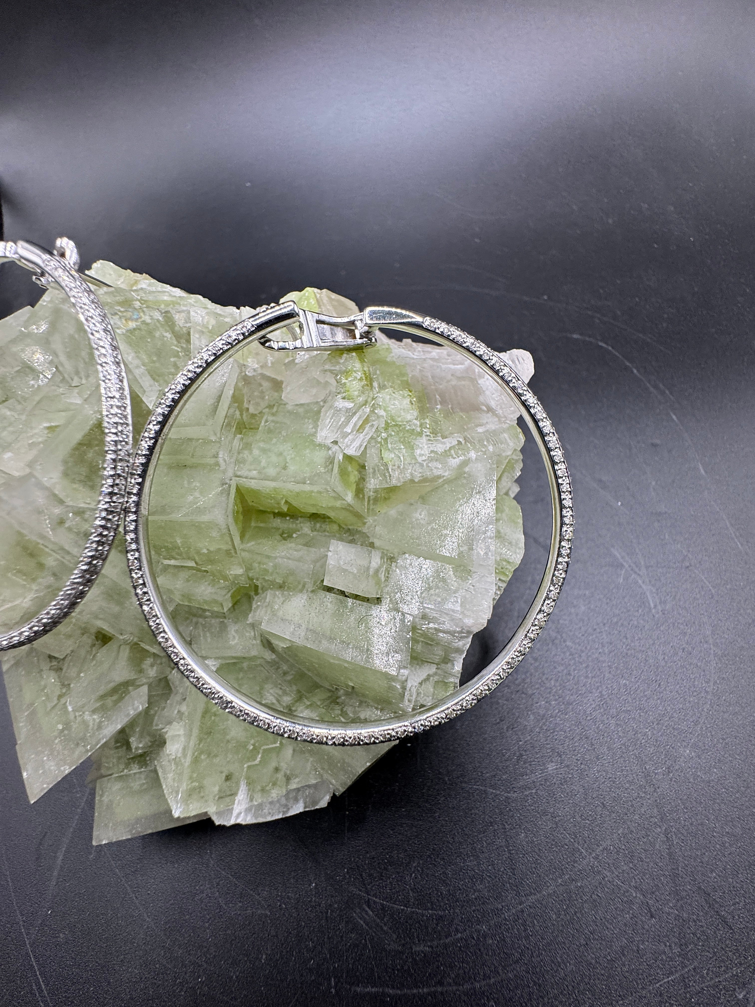 Exceptional 18-karat white gold earrings with 286 brilliant-cut diamonds
