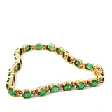 Steinbetontes Armband in 14 Karat Gelbgold mit Smaragden & Brillanten