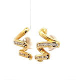Elegante Ohrringe in 18 Karat Gelbgold mit feinen Brillanten