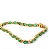 Steinbetontes Armband in 14 Karat Gelbgold mit Smaragden & Brillanten