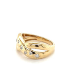 Verspielter Gelbgold-Ring in 14 Karat Gelbgold mit Brillanten & Princess-Cut Diamanten