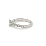 Solitaire ring in 18 carat (750) white gold with 0.5 carat brilliant + small. Diamonds