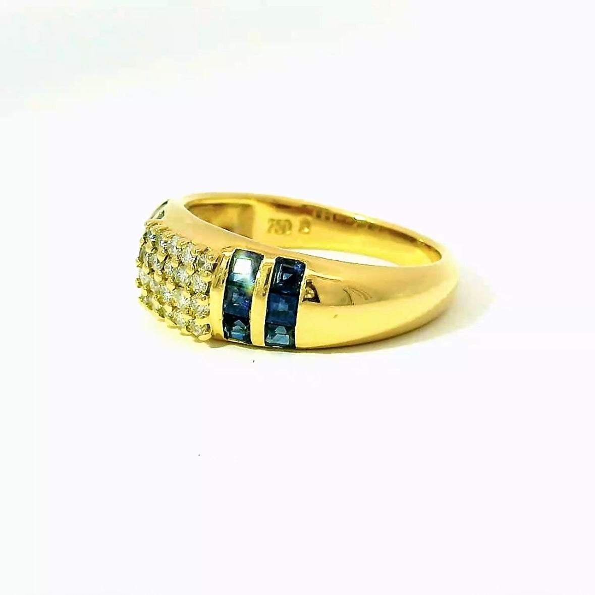 Edler Ring in 18 Karat Gelbgold mit feinen Brillanten & Saphiren
