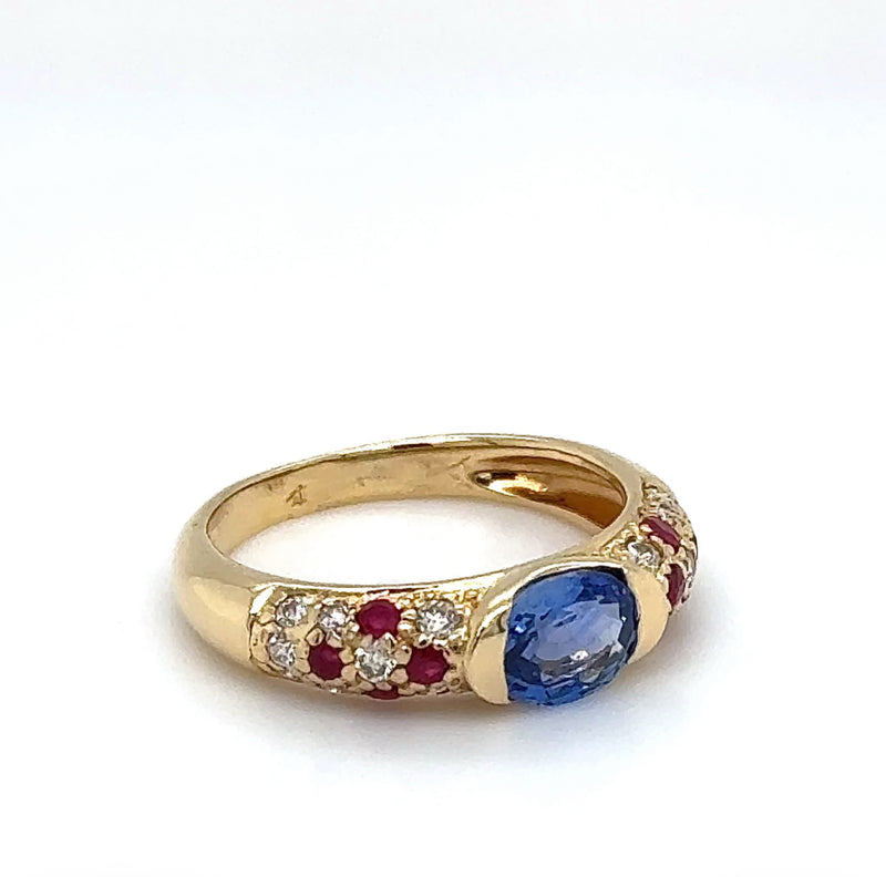 Edler Ring in 18 Karat Gelbgold mit hochfeinen Saphir, Brillanten & Rubine