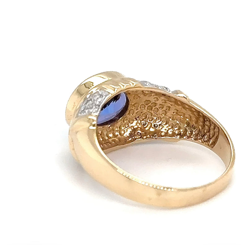 Stilvoller Ring in 14 Karat Gelbgold mit feinen Tansanit und Brillanten