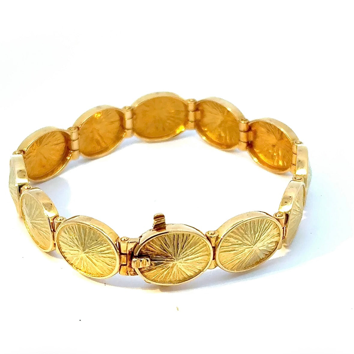 Solid designer bracelet by Fries Arauner in 18 karat (750) yellow gold