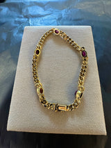 Zeitloses Panzerarmband in 14 Karat Gelbgold mit Rubinen