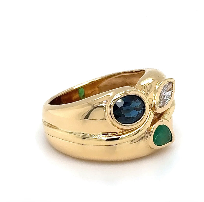 Massiver Ring in 18 Karat Gelbgold mit Smaragd, Saphir und Brillant