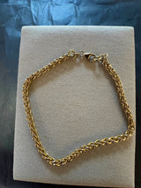 Elegantes Zopf Armband in 14 Karat Gelbgold mit Karabiner