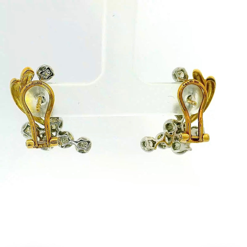 Ausgefallene bicolor Ohrringe in 18 Karat Gold mit feinen Brillanten