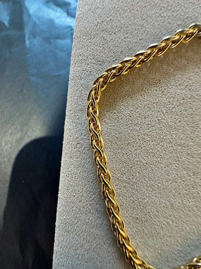 Elegantes Zopf Armband in 14 Karat Gelbgold mit Karabiner