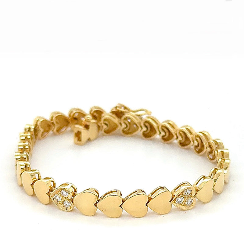 Elegantes Herz-Armband in 18 Karat Gelbgold mit feinen Brillanten