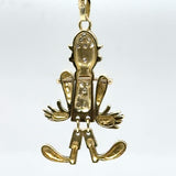 Playful Punch and Judy pendant in 14 carat yellow gold with diamonds