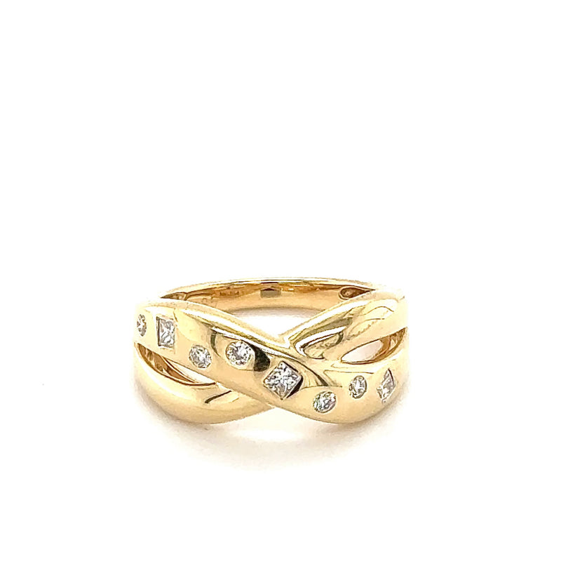 Verspielter Gelbgold-Ring in 14 Karat Gelbgold mit Brillanten & Princess-Cut Diamanten