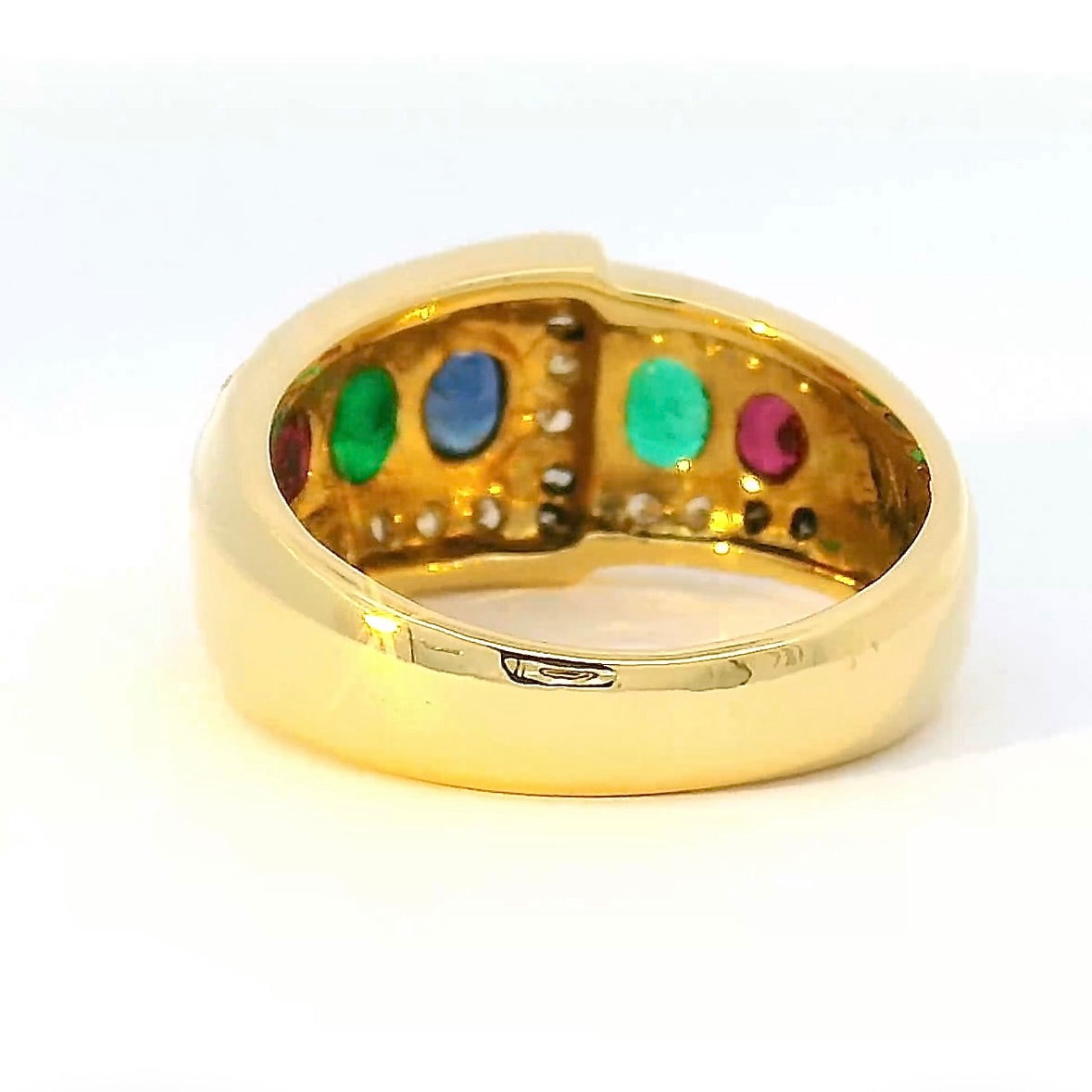 Edler Ring in 18 Karat Gelbgold mit Rubin, Smaragd, Saphir & Brillanten