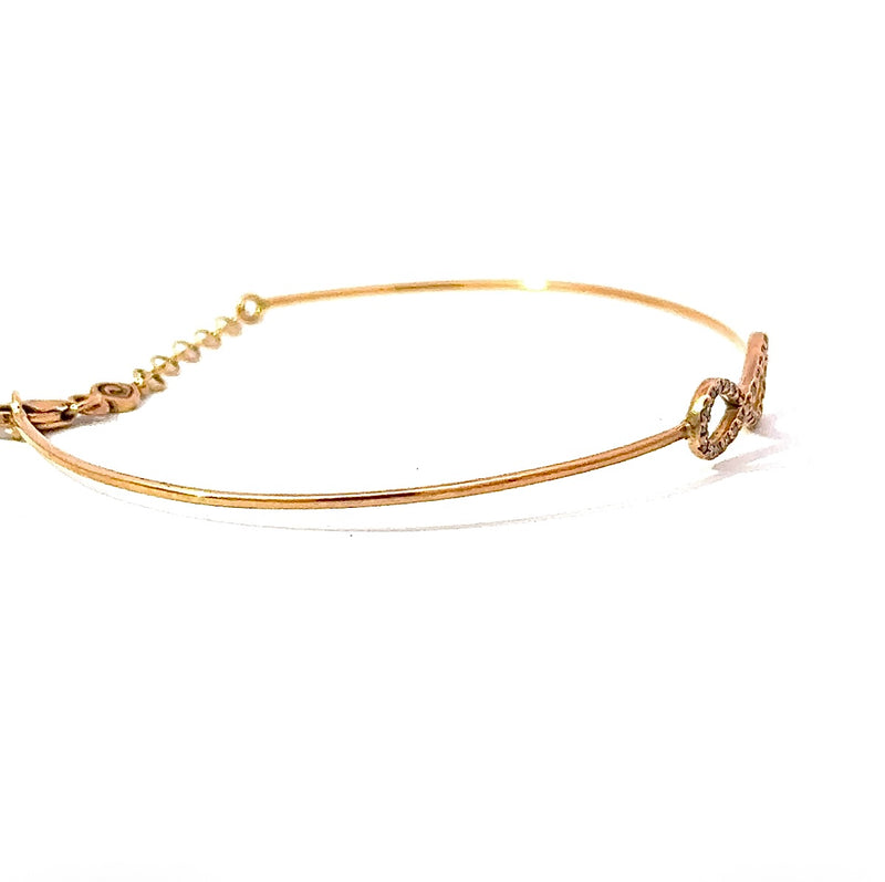 Zierlicher Armreif in 18 Karat warmem Roségold mit Unendlichkeitszeichen