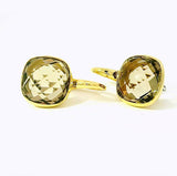 Elegante Kreolen in 18 Karat Gelbgold mit lebhaften Rauchquarzen