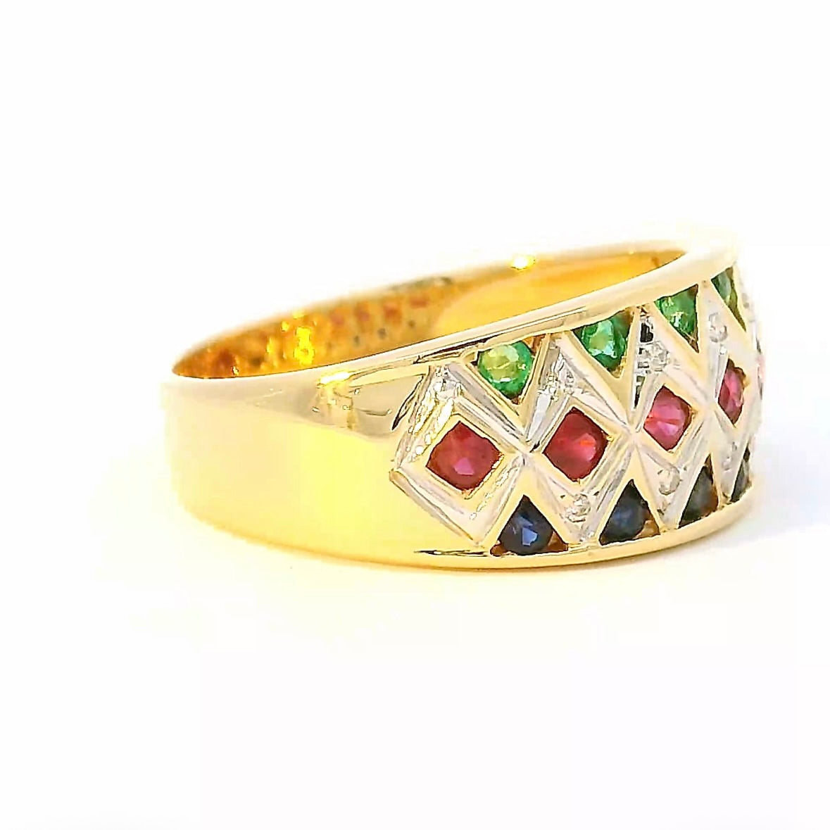 Ausgefallener Ring in 18 Karat Gelbgold mit Smaragd, Saphir, Rubin & Brillanten