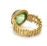 Ausgefallene Handarbeit in 18 Karat Gelbgold mit großem Peridot