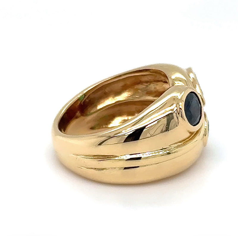 Massiver Ring in 18 Karat Gelbgold mit Smaragd, Saphir und Brillant