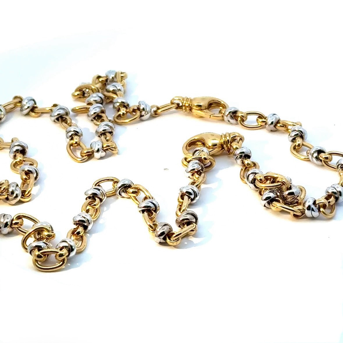 Ausgefallene Halskette in 18 Karat Gelb- und Weißgold mit Armband