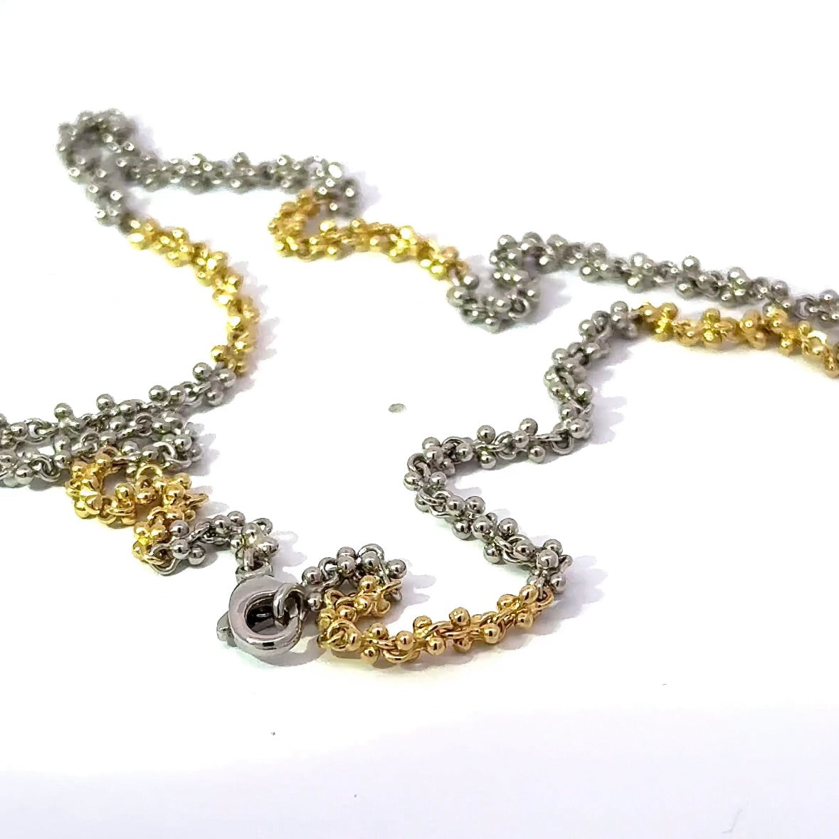 Ausgefallene Halskette in 18 Karat Gelbgold und 950er Platin