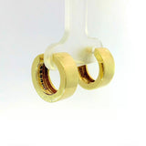 Zeitlose Kreolen in 14 Karat Gelbgold mit Diamanten