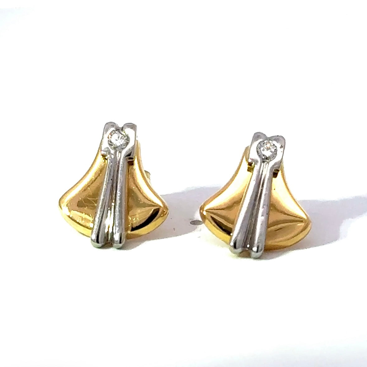 Elegante Bicolor Ohrstecker in 18 Karat Gold mit Brillanten