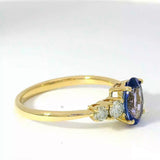 Moderner steinbetonter Ring in 14 Karat Gelbgold mit Tansanit und Brillanten