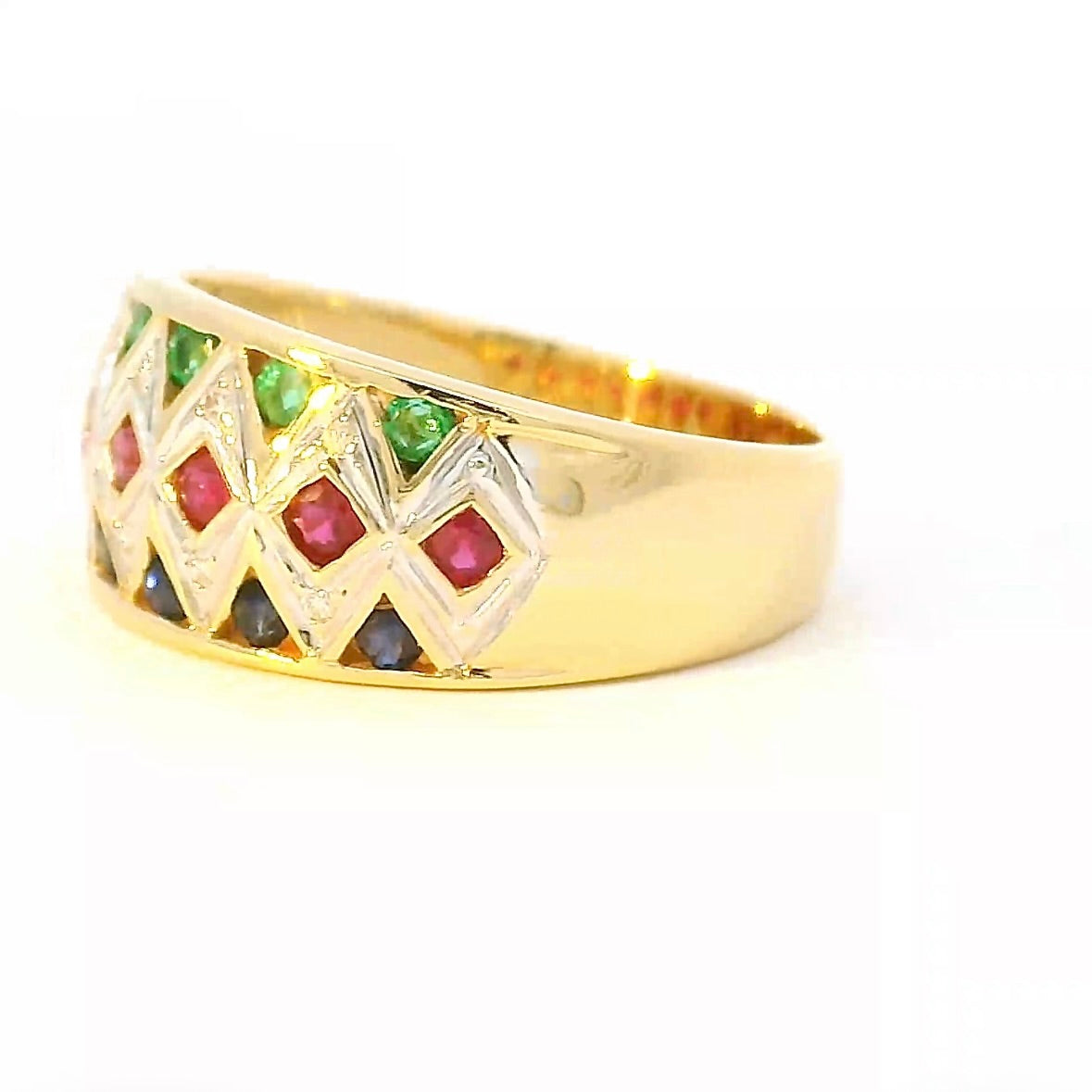 Ausgefallener Ring in 18 Karat Gelbgold mit Smaragd, Saphir, Rubin & Brillanten