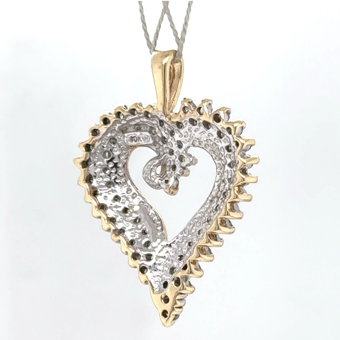 Elegant bicolor hart van 10 karaat goud met 67 diamanten