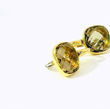 Elegante Kreolen in 18 Karat Gelbgold mit lebhaften Rauchquarzen