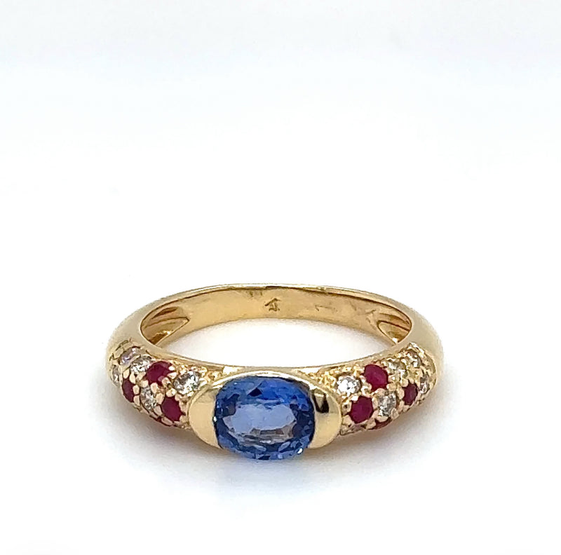 Edler Ring in 18 Karat Gelbgold mit hochfeinen Saphir, Brillanten & Rubine