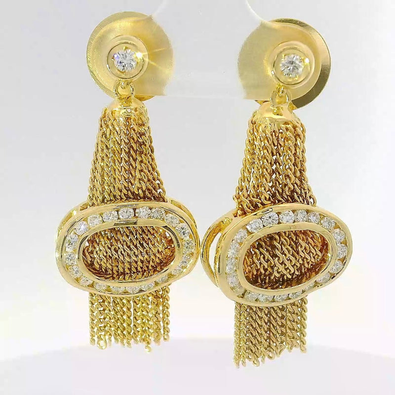 Außergewöhnliche Ohrringe in 18 Karat Gelbgold mit feinsten Brillanten