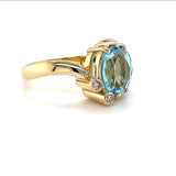 Eleganter Ring in 18 Karat Gelbgold mit hochfeinen Brillanten und Topas