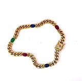 Zeitloses Armband in 14 Karat Gelbgold mit Saphiren, Rubinen und Smaragd