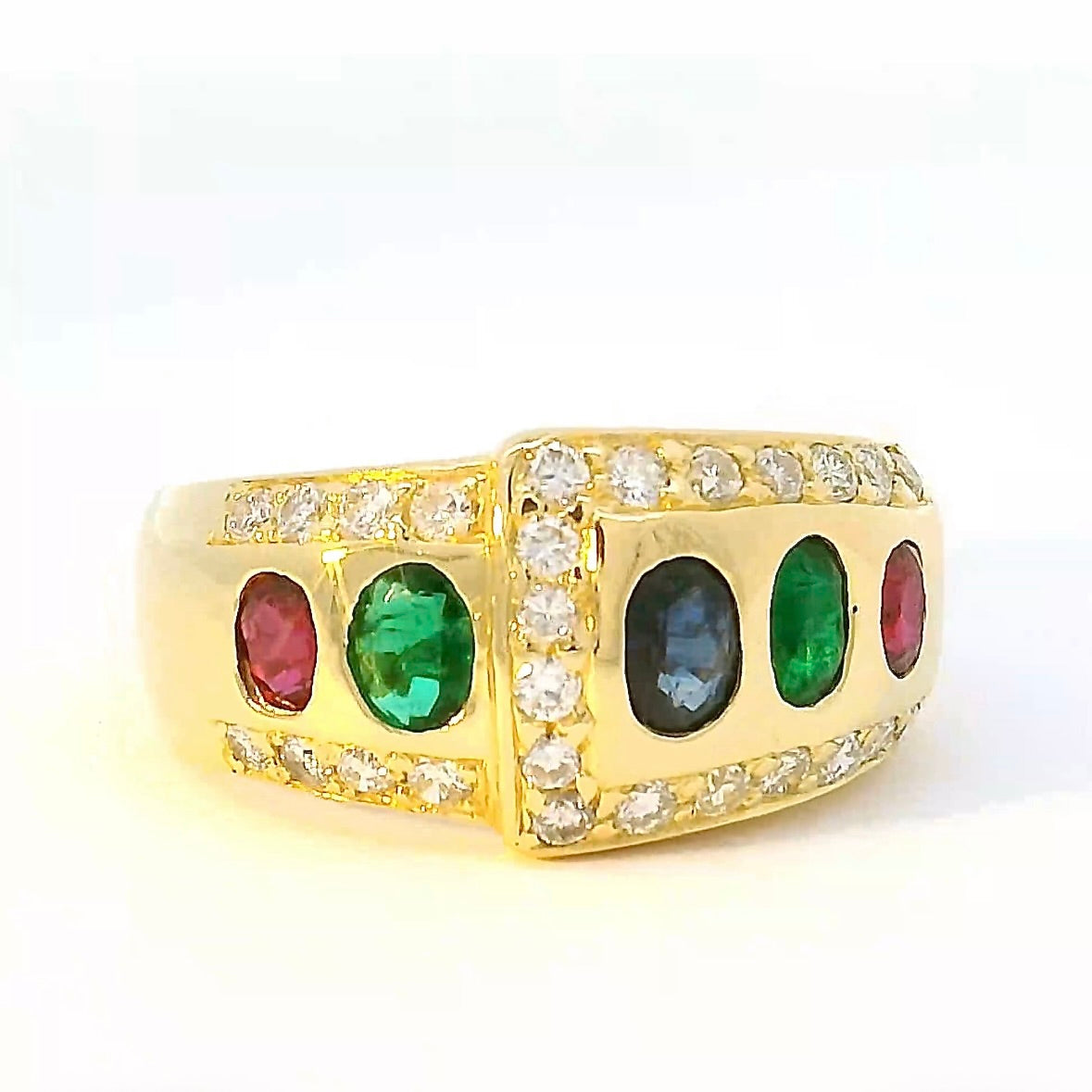 Edler Ring in 18 Karat Gelbgold mit Rubin, Smaragd, Saphir & Brillanten